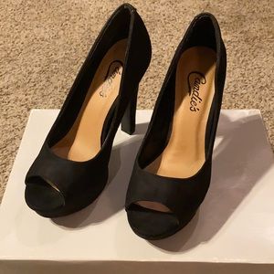 Candie’s black peep toe pumps